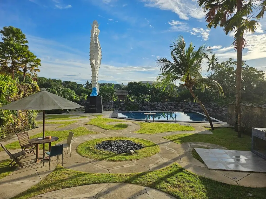 Campus courtyard garden and pool at Divinepath Bali yoga teacher training