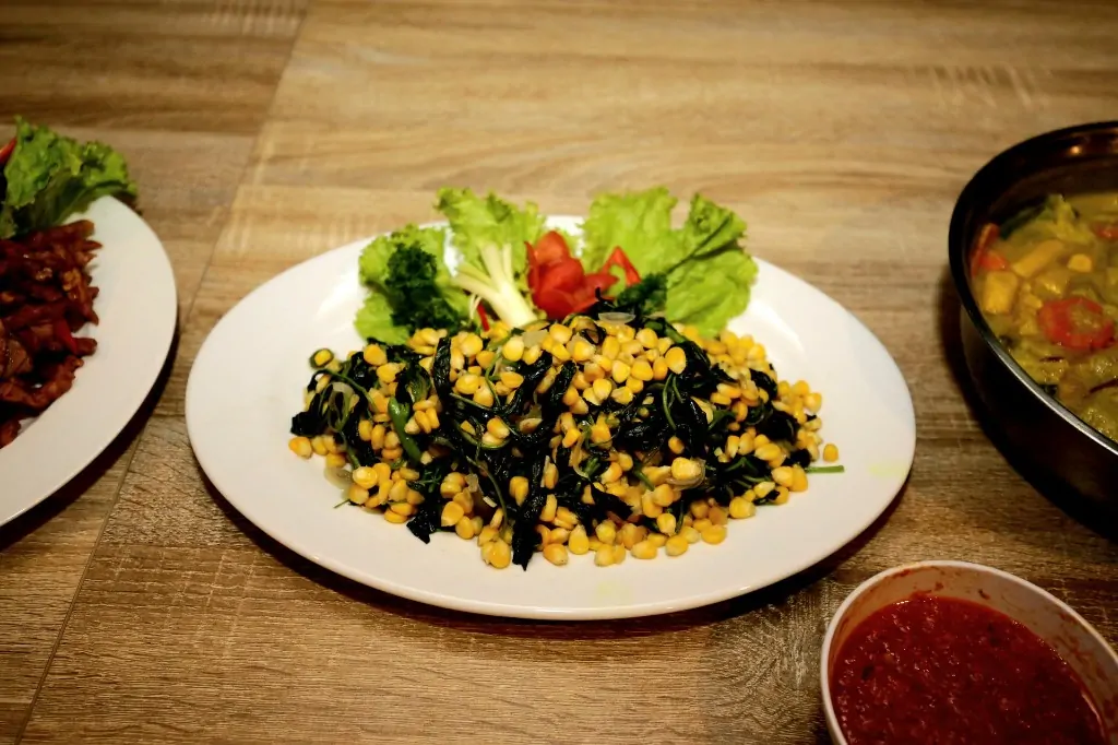 Corn and greens vegetarian plate during 300 hour YTT Bali