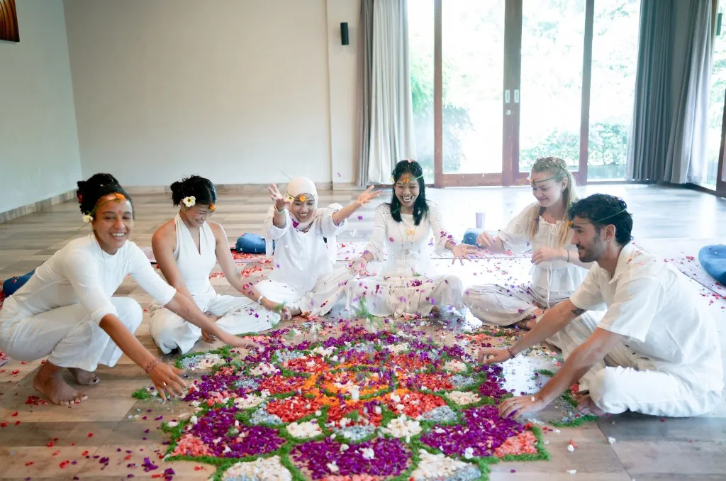 Women celebrating during spiritual flower ceremony in Bali