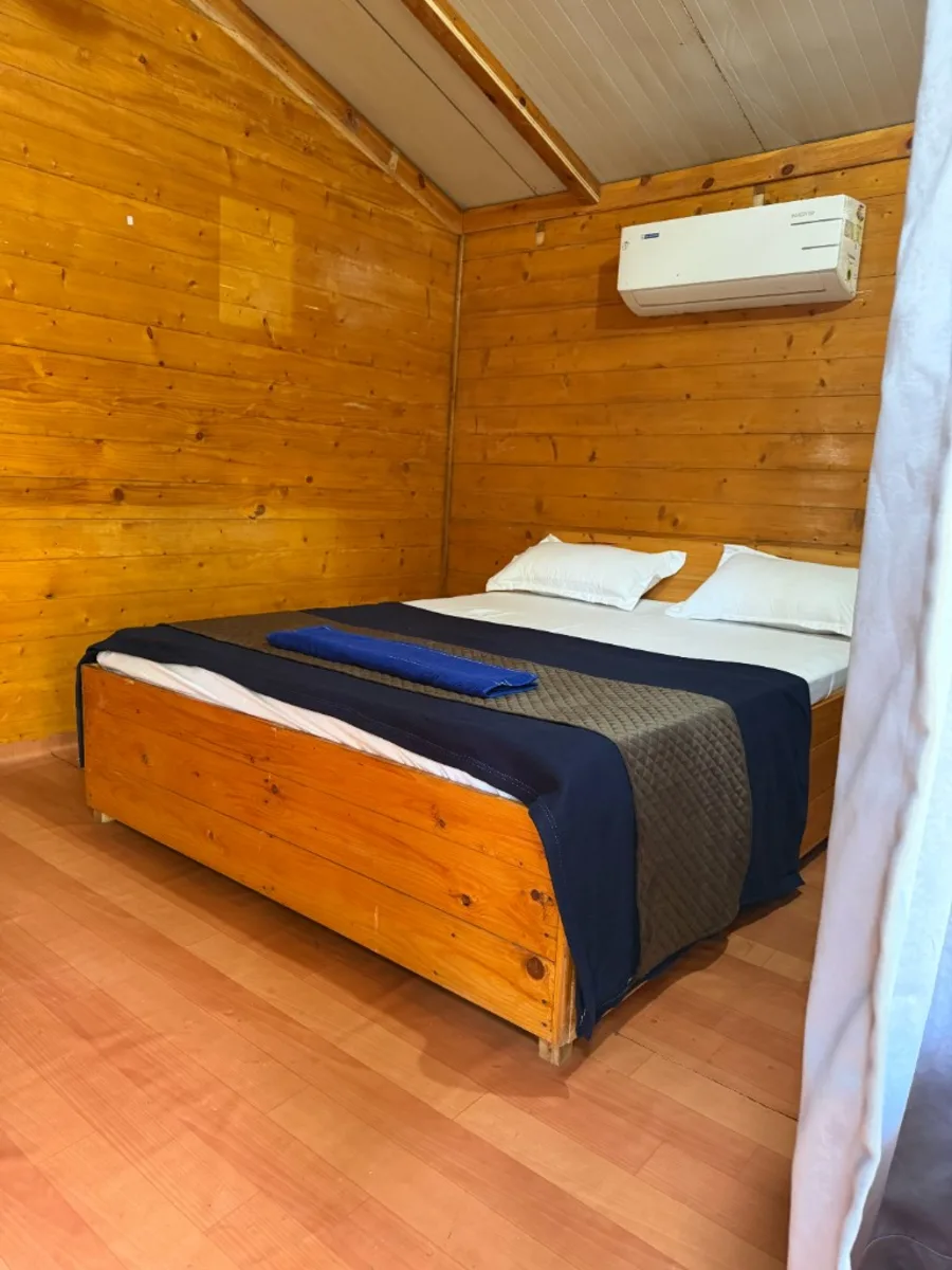AC wooden cottage room for residential 300 hour yoga TTC in Goa