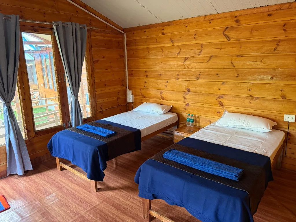 Twin sharing wooden cottage room for 300 hour yoga teacher training in Goa