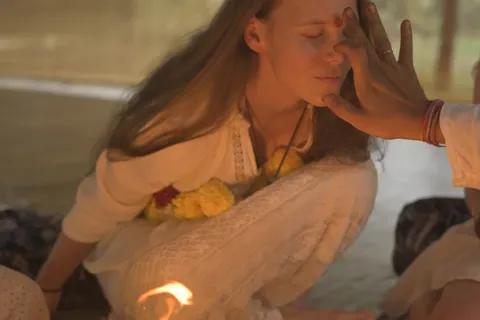 Closing ceremony tilak at Ashtanga yoga teacher training in Goa