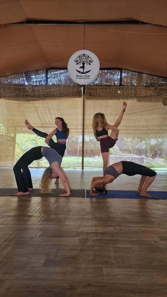 Partner yoga poses in Divinepath Goa shala