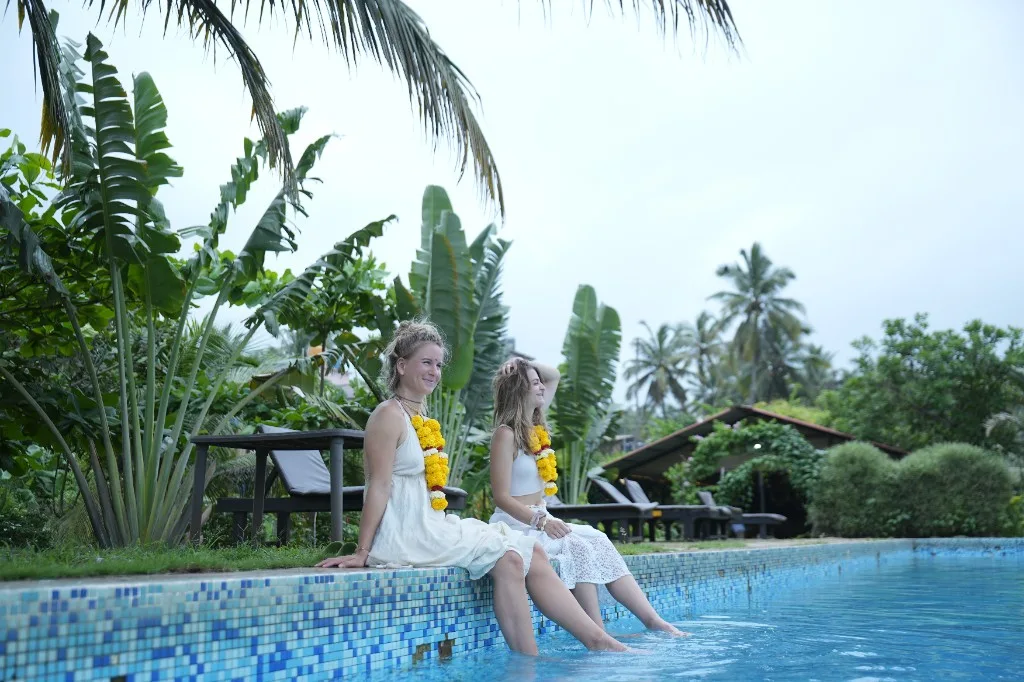 Poolside celebration after the traditional welcome ceremony for YTT in Arambol