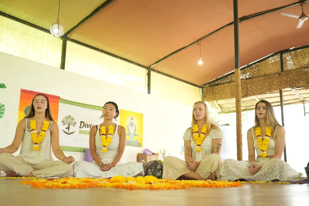 Wide view of opening ceremony in the open-air yoga shala at Divinepath Arambol