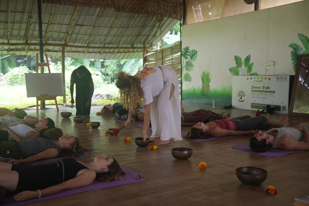 Group sound bath with singing bowls in the DivinePath Goa shala