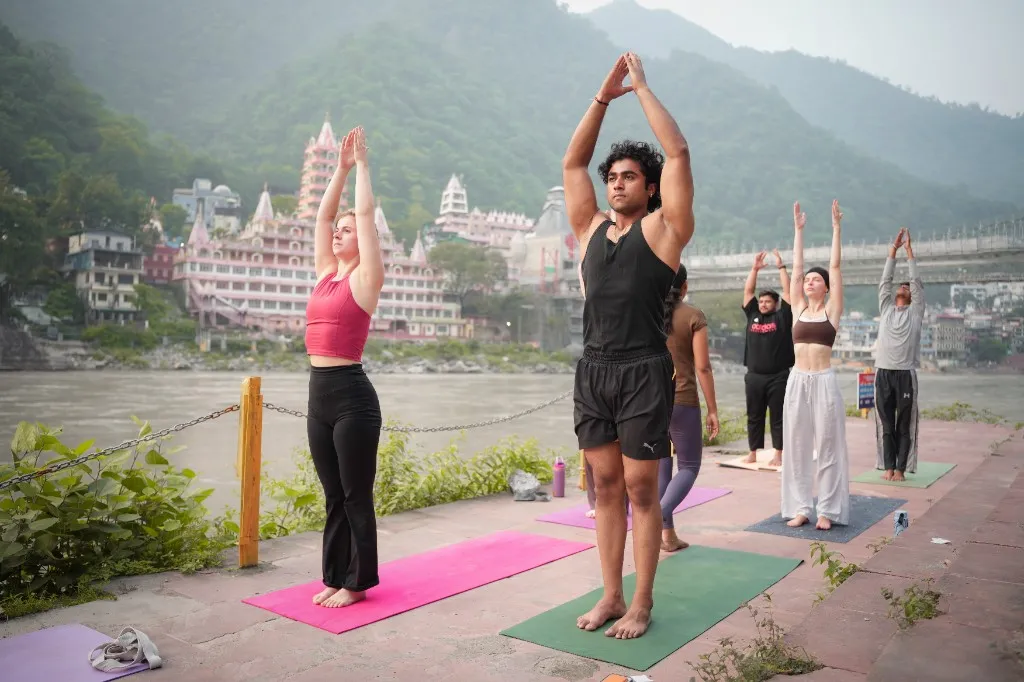 Yoga practice on the Ganga in Rishikesh with Divinepath students