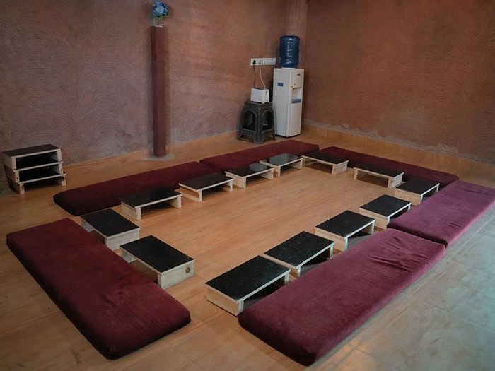 Communal floor seating hall Divinepath Rishikesh