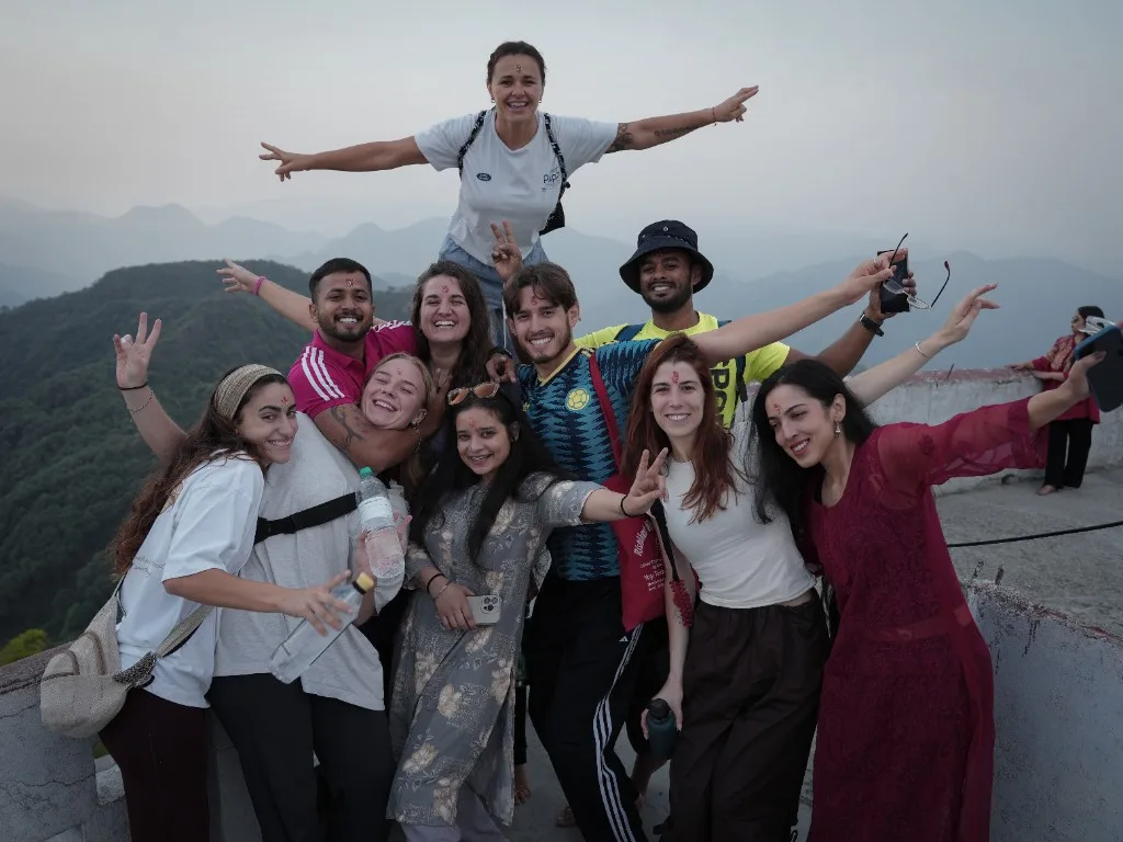 Student group photo on mountain overlook Rishikesh