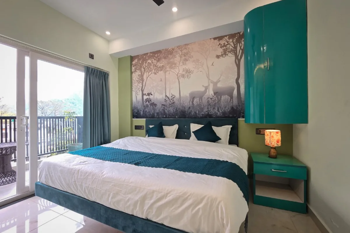 Private room with double bed and mountain balcony at Divinepath Rishikesh