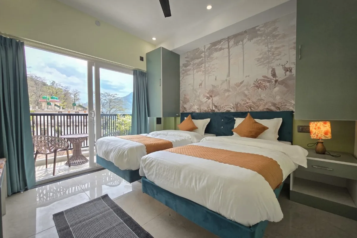 Shared twin room with forest mural at Divinepath Yoga School Rishikesh
