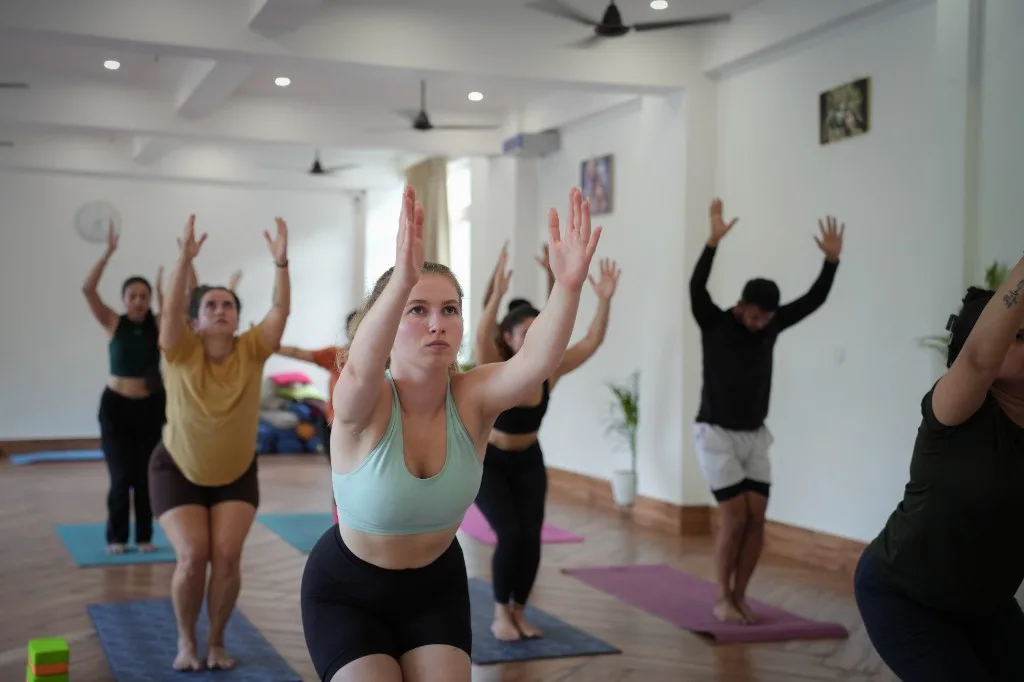 Chair pose group class Divinepath Rishikesh