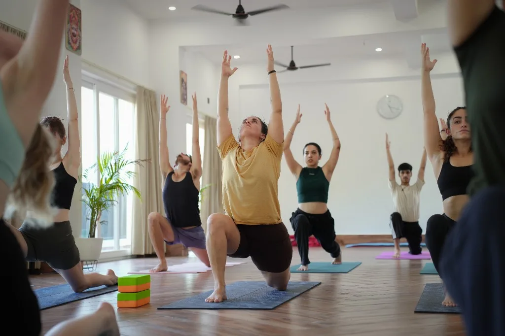 Crescent lunge class in Rishikesh yoga shala