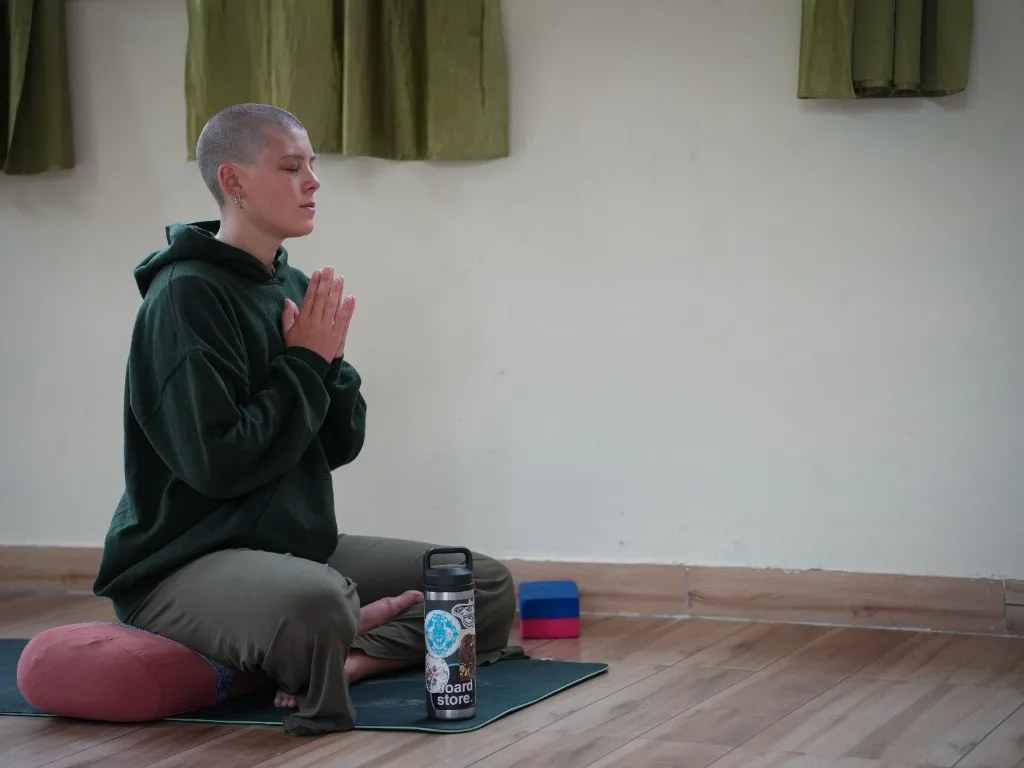 Indoor meditation class Anjali Mudra Divinepath Rishikesh