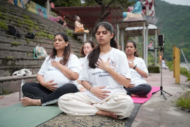 Prenatal yoga instructor certification class on the Ganga ghat in Rishikesh