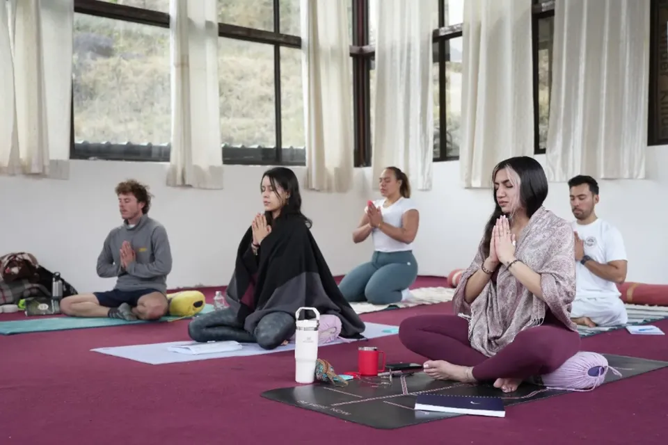 Students in seated meditation during the first week of 200-hour teacher training in Rishikesh
