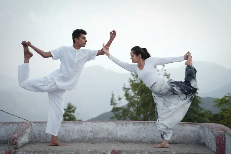 Small-group teaching practicum with a side lunge adjustment during week three in Rishikesh